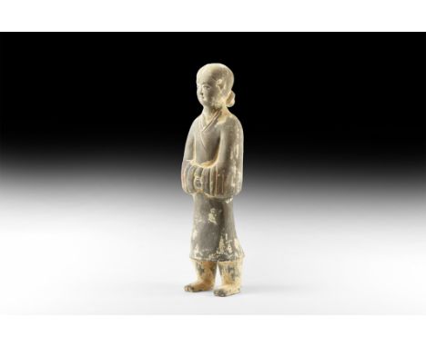 Han Dynasty, 206 BC - 220 AD. A large ceramic figure of a male with hair parted and pulled back to a bun; wearing long robes 