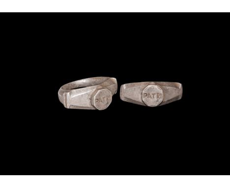 2nd-3rd century AD. A silver finger ring with D-section facetted tapering hoop, sloped shoulders with collar to the outer end