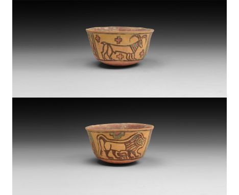 3rd millennium BC. A ceramic Nal culture cup decorated with panels of polychrome pigment, with a walking lion to one side, a 