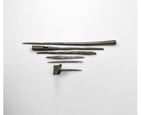 10th-15th century AD. A mixed group of iron tools including square-section awls, round-section spikes and a clout nail. 227 g