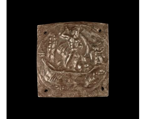 1st-2nd century AD. A sheet silver square with repoussé ornament and a hole to each corner; a cloaked warrior with helmet and