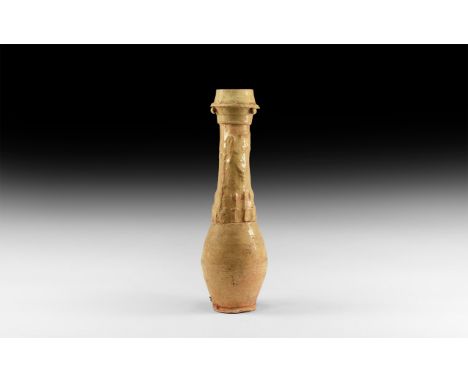 Song Dynasty, 960-1127 AD. A cream-glazed ceramic granary jar with a row of facing guardian figures with zodiac(?) figures ar