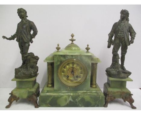A 19th century Onyx mantle clock and two garnitures in the form of gents, raised on onyx and gilt metal feet.  The clock or a