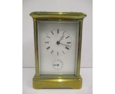 A late 19th/early 20th century Victor Reclus French alarm carriage clock. The white enamel dial having Roman numerals, bregue