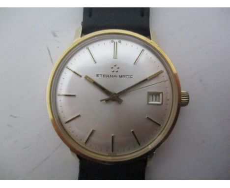 An Eterna Matic gents 9ct gold automatic wristwatch having a silvered dial, baton markers, date aperture at 3 and on a later 
