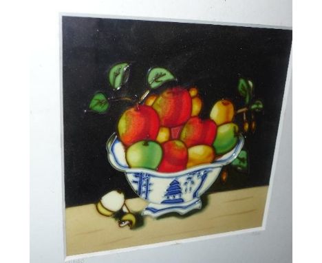 A ceramic picture of fruit in a Chinese blue and white porcelain bowl, signed 'Sam' in pencil, numbered 24/120, framed and gl