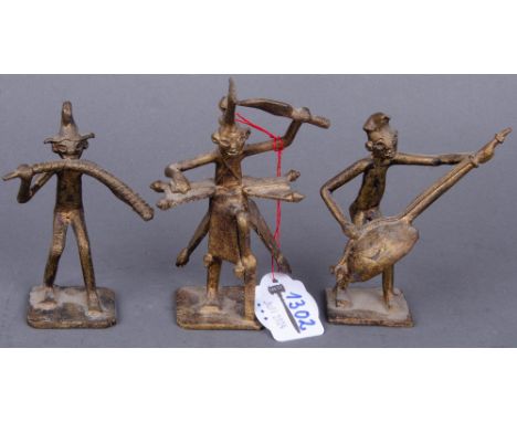 Tänzer und zwei Musikanten. Afrika. Bronze, H=10 bis 12,5 cm. 