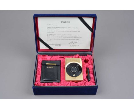 A Canon IXUS 1X240 60th Anniversary APS Camera, body VG, with case, remote control, strap, matching serial number thank you l