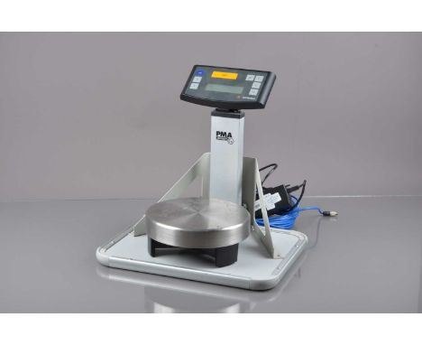 A Sartorius PMA 7501 paint mixing scales,  suitable for use in hazardous environments, 380mm high, with shelf for wall mounti