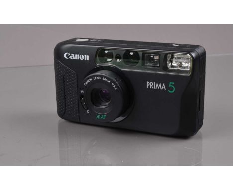 A Canon Prima 5 Compact Camera, powers up, shutter working, flash working, body G-VG, elements G-VG, with manual, in maker's 