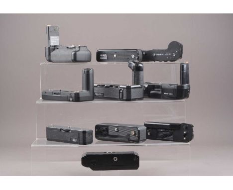 A Group of Motor Drives, including a Nikon MB-10, MD-11, Pentax Winder ME II, Minolta Auto Winder,  MD-90, np-90mCanon Power 