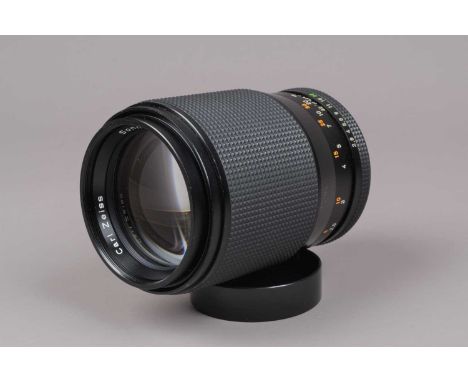 A Carl Zeiss T* 135mm f/2.8 Sonnar Lens, MM type, C/Y mount, serial no 6870056, barrel G-VG, one light scratch below grip, el