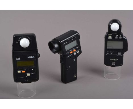 Three Minolta Light Meters, a Minolta Auto IV F, powers up, meter res[ponsive, auto meter III, missing battery cover, powers 