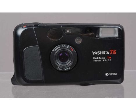 A Yashica T4 Compact Camera, powers up, shutter working, flash working, self timer working, body G-VG, with Carl Zeiss T* 35m