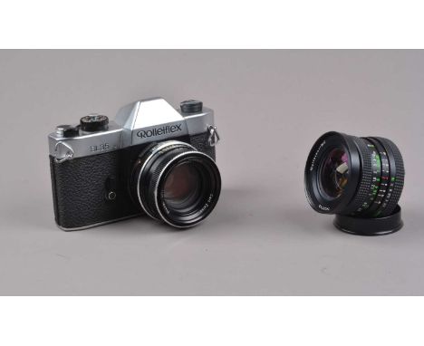 A Rolleiflex SL35 SLR Camera,  shutter working, meter not tested, self timer working, body G, with a Rolleinar MC 28mm f/2.8 