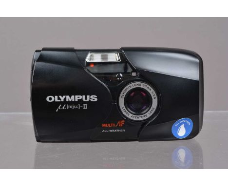 An Olympus mju II Compact Camera,  powers up, shutter working, flash working, self timer working, body G-VG, elements G-VG, w