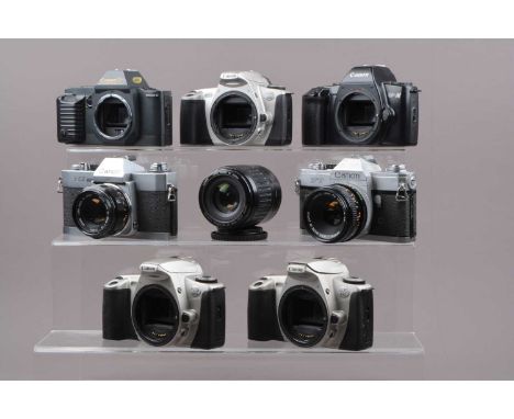 A Group of Canon SLR Cameras, a Canon FT, shutter sluggish on slow speeds, self timer working, body P-F, pitting, with 50mm f