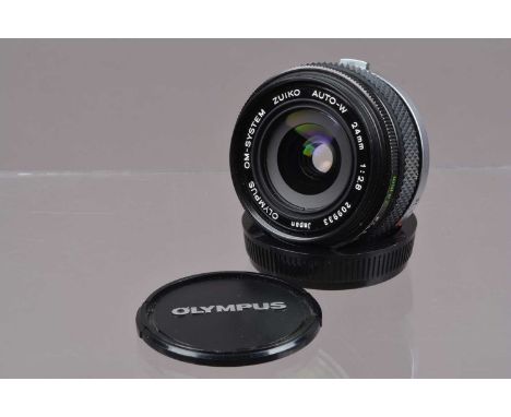 An Olympus Zuiko 24mm f/2.8 OM Lens, barrel G, some light paint wear, elements G-VG, with front/rear caps, in unbranded lens 