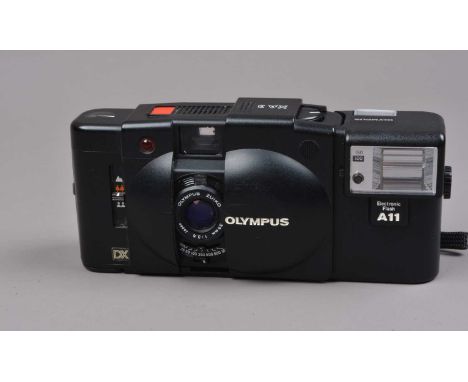 An Olympus XA 3 DX Compact Camera, shutter working, self timer working, body G-VG, elements G-VG, with A11 flash, flash worki