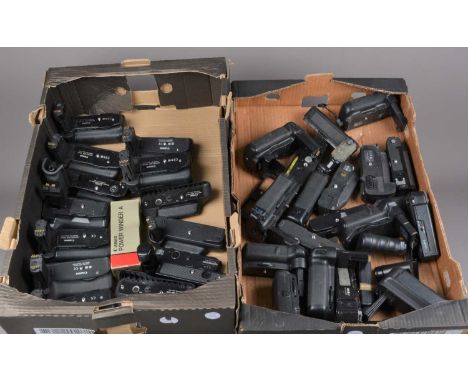 Two Trays of Battery Grips,  Canon grips including two BG-E2, two BG-E2N, two BG-E14, a BG-E9, two VG 10 verticle grips, Niko