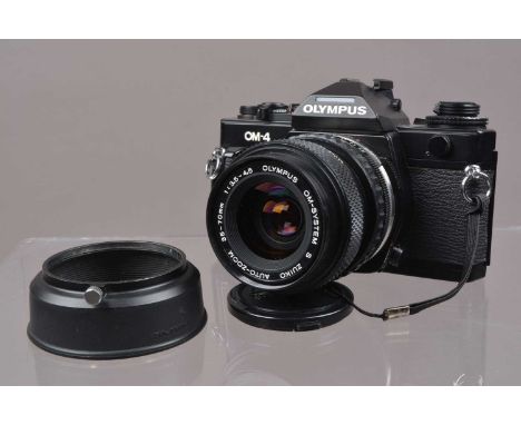 An Olympus OM-4 SLR Camera, shutter working, meter responsive, self timer working, appears to function as should, body G-VG, 