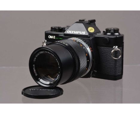 An Olympus OM-2 Spot/Program SLR Camera,  shutter working, meter responsive, appears to function as should, self timer workin