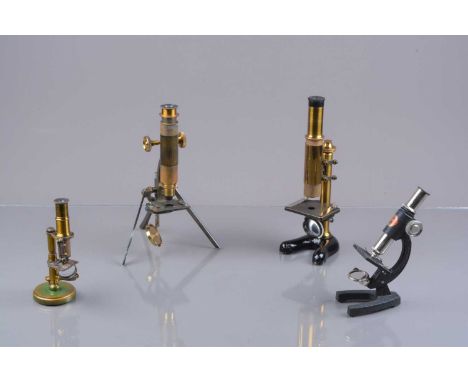 Late 19th/early 20th Century brass draw-tube focusing Compound Monocular Microscopes,  folding student's model, with eyepiece