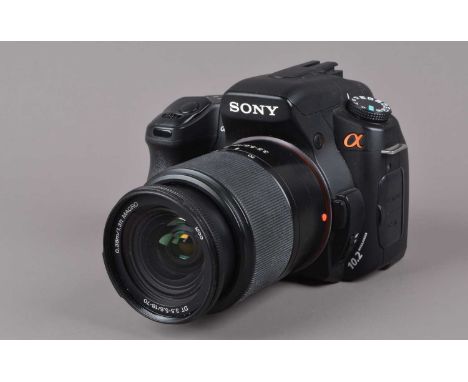 A Sony a200 DSLR Camera,  powers up shutter working, flash working, body G, with DT 18-70mm f/3.5-56 lens, auto focus working