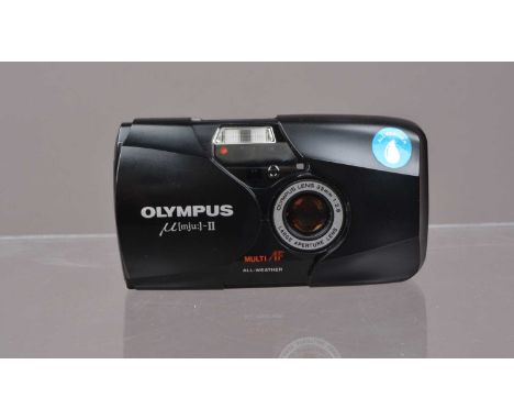 An Olympus mju II Compact Camera,  powers up, shutter working, flash working, self timer working, body G-VG, elements G-VG, w