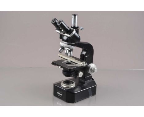 A Nikon S-Ke Microscope with Kohler Illumination,  with quintuple nosepiece, five objectives by Nikon and other maker's, mech