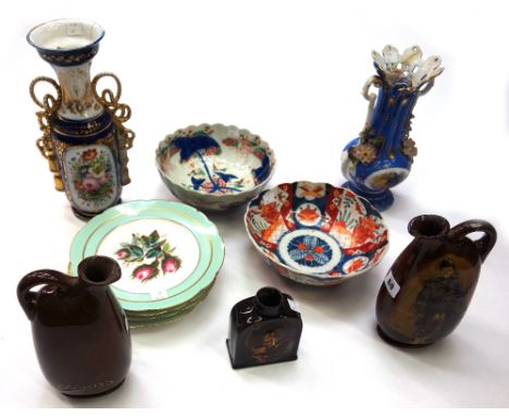 A pair of Doulton Series ware flasks and a tea caddy, 21 & 12cm high, respectively, two Paris porcelain vases and four plates