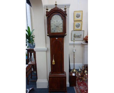 Crake, Loddon:  an early 19th century mahogany longcase clock, boxwood banded and foliate inlaid, the arched hood with freest