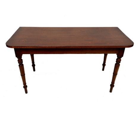 A George III mahogany dining table, in three parts, the rectangular top with rounded corners, having two extra leaves, origin