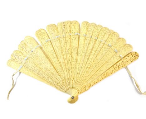 A Canton caved ivory brisee fan, Qing dynasty, 19th century, the guard stick with trees and figures in pavilions to pierced a