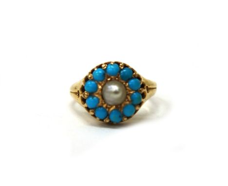 A late Victorian 18ct gold, turquoise and half pearl cluster ring, centred with a half pearl within a small cabochon turquois