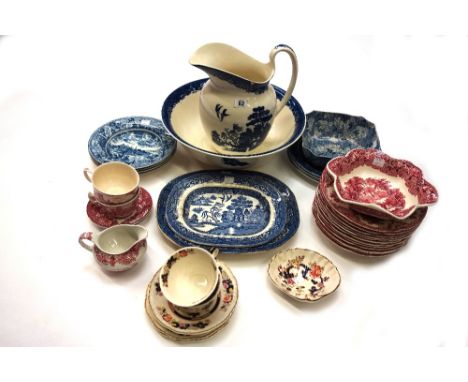 A Willow pattern blue transfer printed toilet jug and basin, 20th century, six various Willow pattern plates, four Historic A