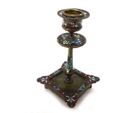A French Champleve enamel and gilt metal candlestick, circa 1870, with green onyx inset base, 15cm high.