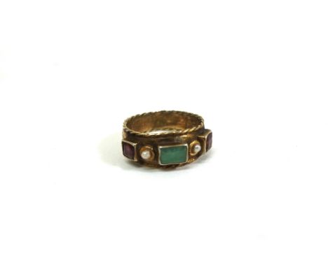 An Austro-Hungarian silver gilt and gem set ring, with a rectangular pale green stone between two small pearls and two square