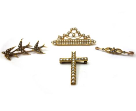 A collection of Edwardian gold and half pearl jewellery, comprising; a Latin cross, engraved verso '1900'; a scrolling brooch