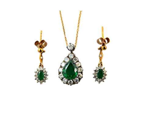 An emerald and diamond cluster pendant and a pair of earrings, the drop-shaped pendant centred with a pear-shaped emerald app