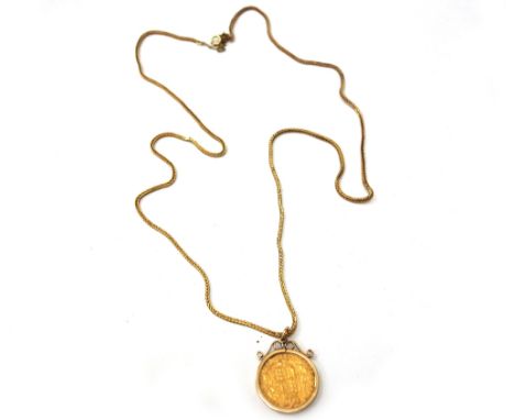 A young head sovereign, 1870, with shield back, loosely mounted in a modern 9ct gold pendant mount, 9.5gms gross; now on an 1