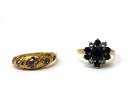Two gold rings, comprising a Victorian gold and diamond five stone gypsy ring, with chased and engraved head showing remnants