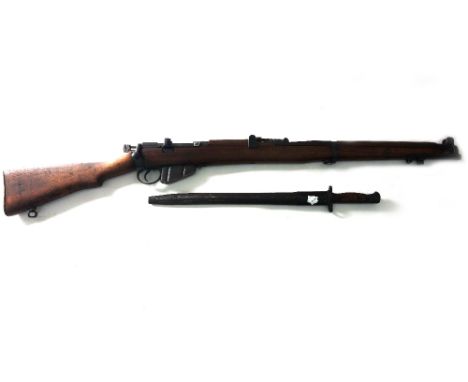 A deactivated Lee Enfield .303 rifle with short magazine, dated 1914, numbered 19784 and stamped 'CP BS 1914 8HT LE III *', t