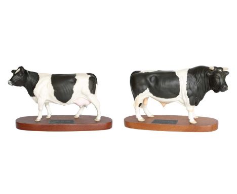 Beswick Connoisseur Cattle Comprising: Friesian Bull, model No. A2580 and Cow, model No. A2607, both on wooden plinths (2)Bot