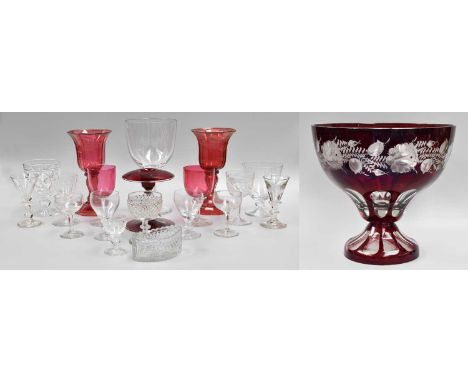 A Bohemian Ruby Flashed Pedestal Bowl; a pair of cranberry glass goblets and a small collection of glassware including a Mura