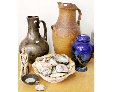 A Large Salt Glazed Stoneware Ewer, a similar West German pottery ewer, a Studio pottery table lamp base, three other pieces 