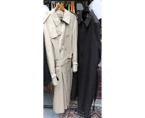 Ralph Lauren Black Trench Coat with button fastening, belt tie, side pockets (size 44 R),and a Burberrys' Light Tan Double Br