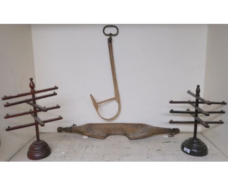 A small yoke, two bobbin holders and a wooden frame (4) Condition Report: Available upon request