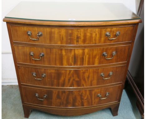 A mahogany bow front chest with four graduating drawers on bracket feet, 88cm high x 84cm wide x 48cm deep Condition Report: 