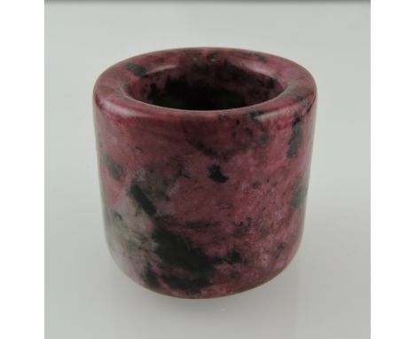 A hardstone nephrite jade archer's thumb ring.